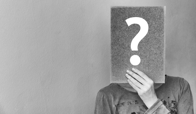 Canva - Person Holding Question Mark.jpg